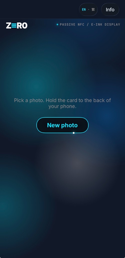 App home screen: in-app wordmark, EN · 繁 and Info pills, helper line 'Pick a photo. Hold the card to the back of your phone.', cyan-outlined New photo pill.