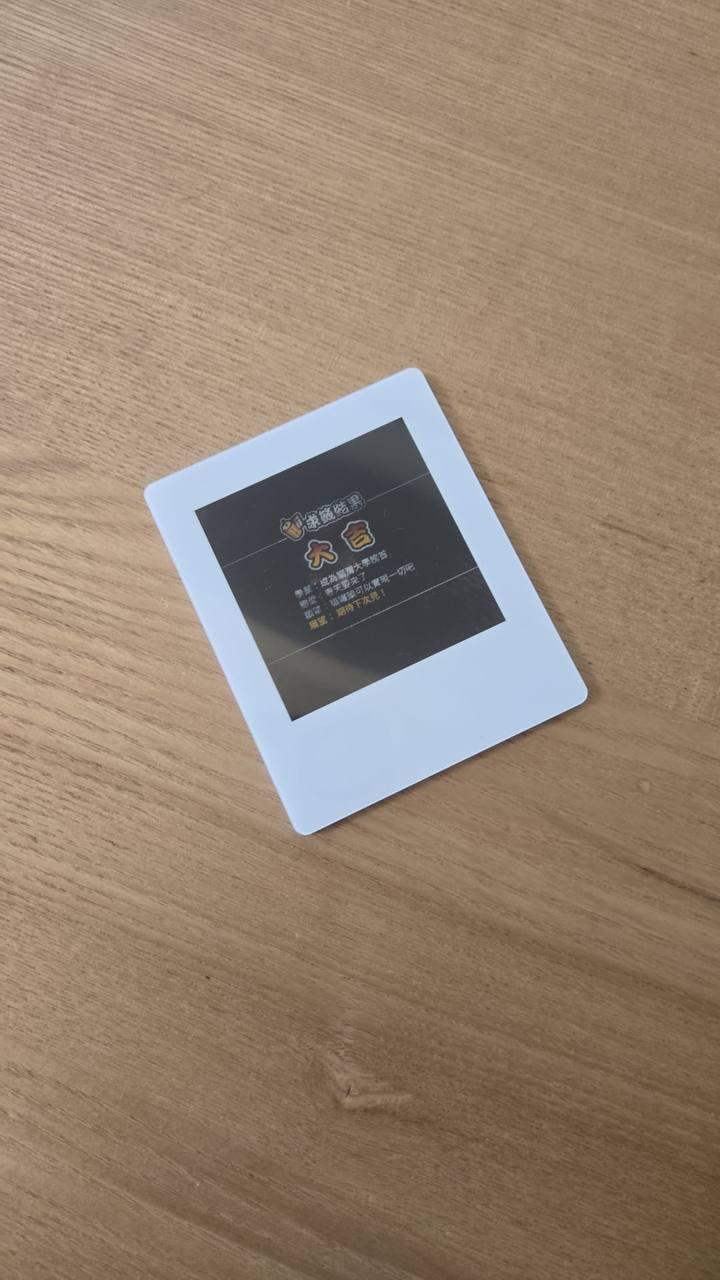 Z3RO card on a wood table, unretouched phone photo